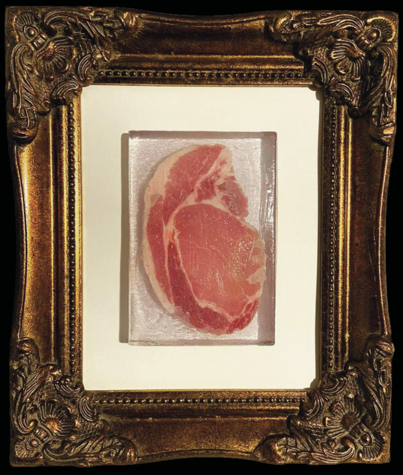 portrait of a long pig / resin and pork steak / 2023